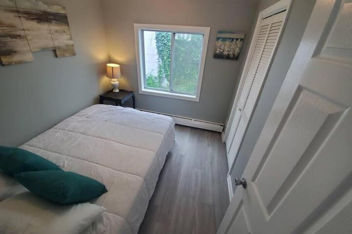 Beachy Bay Breeze Bungalow 2BR with parking and close to many amenities.