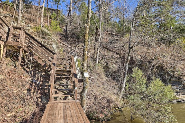 Lake Mitchell Vacation Home w / Dock & Water Slide