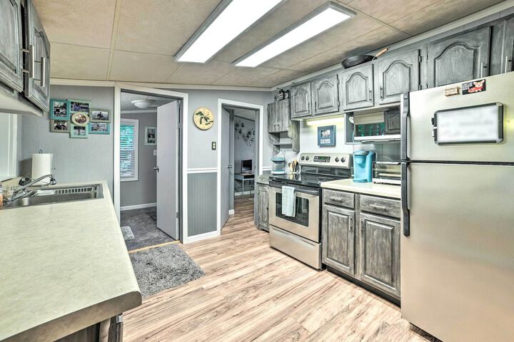 Riverfront Home w / Dock 6 Mi to Cheboygan!