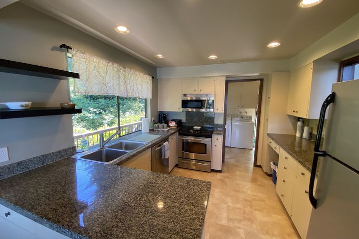 PNW MCM 155ft Private Waterfront Gem on Raft Island w / Hot Tub 3 Bedroom Home by RedAwning