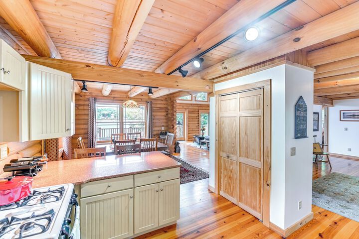 Lakefront Corinth Log Home: Private Dock Fire Pit
