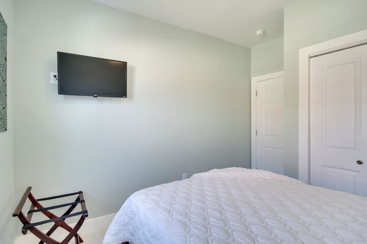 Sunny Waveland Home Rental w / Pool: Walk to Beach!