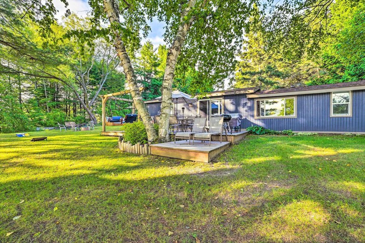 Riverfront Home w / Dock 6 Mi to Cheboygan!