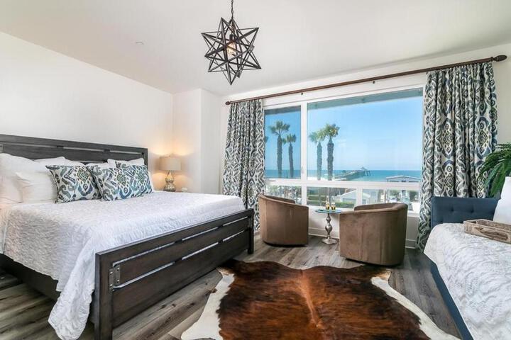 Ocean View 3 Bedrooms Condo just steps from the park, pier & water!