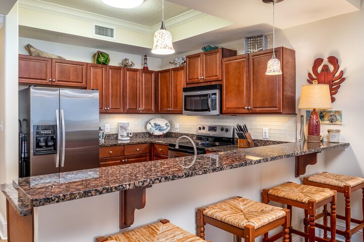 Calm Seas - Holiday Isle #119 - Tremendous Views a Beautiful Gulf Front Pool, A Heated Indoor Pool, Jacuzzi, Steam Room, & Gulf View Fitness Center. 2 Bedroom Condo by RedAwning