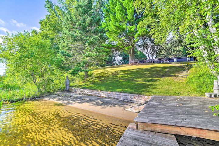 Riverfront Home w / Dock 6 Mi to Cheboygan!