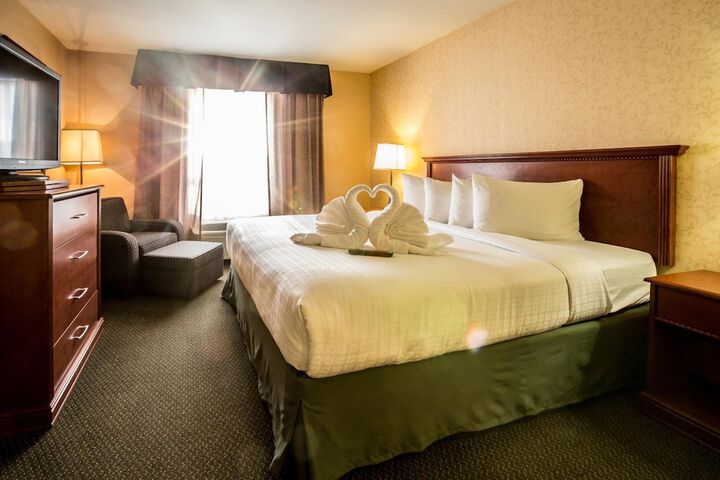 Merit Hotel & Suites