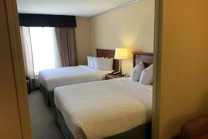 Merit Hotel & Suites