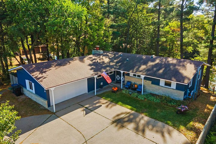 Antiquing & Fishing: Riverfront Waupaca Home!