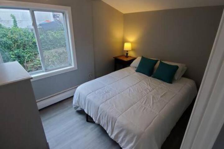 Beachy Bay Breeze Bungalow 2BR with parking and close to many amenities.