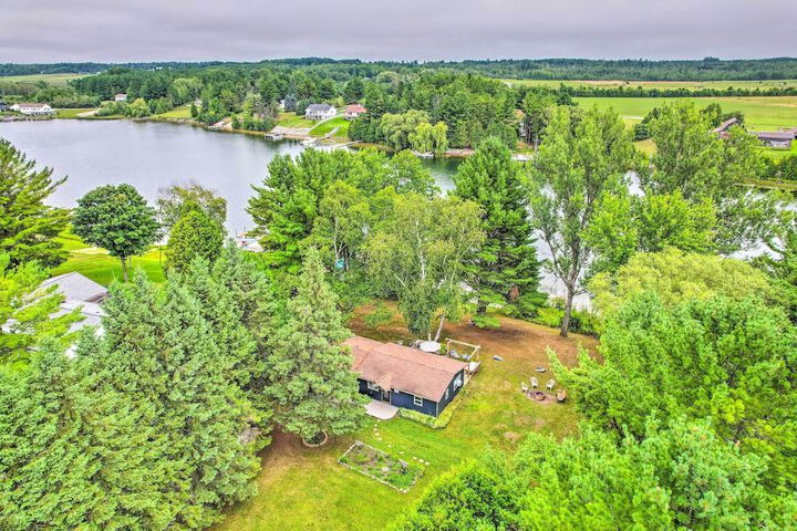 Riverfront Home w / Dock 6 Mi to Cheboygan!