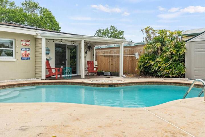 SunKissed in St. Pete is a 3 BR Home with Heated Pool and great outdoor space Near the Beach