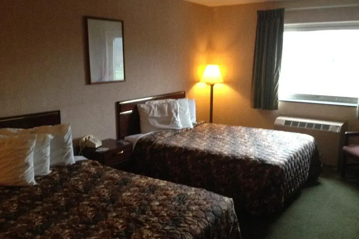 Travel Hotel & Suites