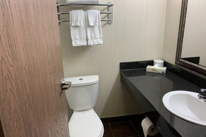 Merit Hotel & Suites