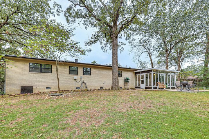 Sunroom & Yard: Charming Hot Springs Home!