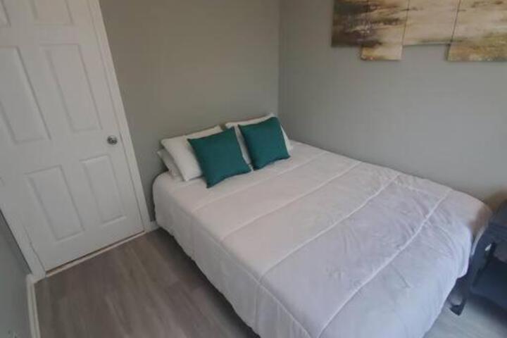 Beachy Bay Breeze Bungalow 2BR with parking and close to many amenities.