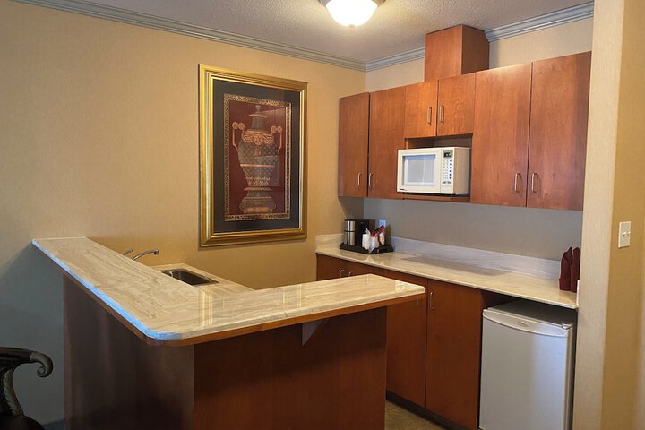 Merit Hotel & Suites