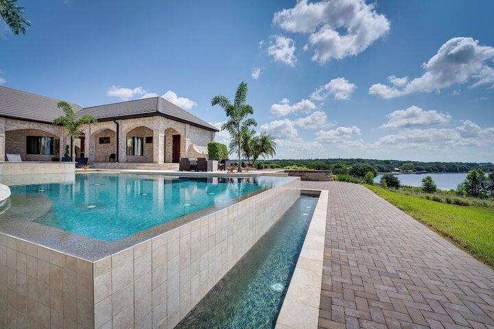 Groveland Home w / Pool: Luxurious Lakefront Oasis!